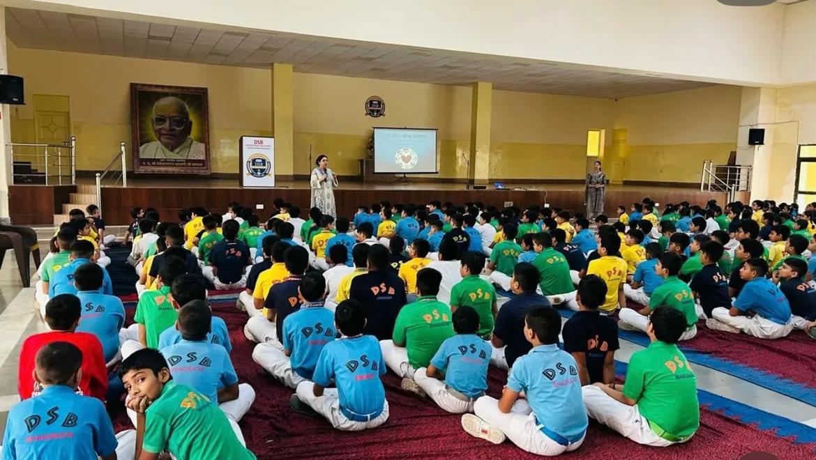 DSB International Public School recently observed World Mental Health Week with a series of engaging workshops for teachers and students. The workshops were expertly conducted by Mrs. Varuna Sehgal and Mrs. Amita Raturi, with Dr. Santosh Kumar from AIIMS as the guest speaker. Students participated in creative sessions, expressing their thoughts and learnings about mental health through drawings and posters. The workshops aimed to educate students and teachers on the importance of mental well-being, fostering a supportive school community. By organizing these activities, the school emphasized the significance of mental health awareness, promoting a culture of care and understanding.
